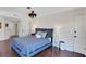 Tranquil primary bedroom featuring hardwood floors, neutral colors, and ample closet space at 355 21St Ne Ave, St Petersburg, FL 33704