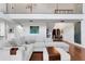 Bright open living room with hardwood floors, high ceilings, a large comfortable sofa, and an open floor plan at 355 21St Ne Ave, St Petersburg, FL 33704