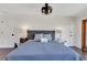 Cozy main bedroom features neutral decor, new ceiling fan, and an abundance of natural light at 355 21St Ne Ave, St Petersburg, FL 33704