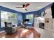 Comfortable office with large windows, ceiling fan, hardwood flooring and built in fireplace at 355 21St Ne Ave, St Petersburg, FL 33704