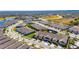 A beautiful aerial view of homes in a well-maintained community with mature landscaping at 3753 Maxwell Park Dr, Sun City Center, FL 33573