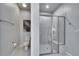 Modern bathroom featuring a glass-enclosed shower and contemporary fixtures at 3753 Maxwell Park Dr, Sun City Center, FL 33573