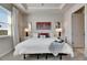 Cozy bedroom featuring neutral tones, soft carpet, and a tranquil atmosphere at 3753 Maxwell Park Dr, Sun City Center, FL 33573
