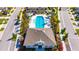 Aerial view of the Preserve's community pool, clubhouse, and lounge chairs for relaxing at 3753 Maxwell Park Dr, Sun City Center, FL 33573