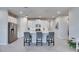 Bright and airy kitchen with stainless steel appliances and large island at 3753 Maxwell Park Dr, Sun City Center, FL 33573