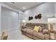 Inviting living room with a recliner sofa, decor and bright light at 3753 Maxwell Park Dr, Sun City Center, FL 33573