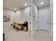 Cozy office space with a desk, plant and a neutral color palette at 3753 Maxwell Park Dr, Sun City Center, FL 33573