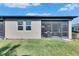 A screened-in patio with outdoor furniture offers a relaxing extension of living space at 3753 Maxwell Park Dr, Sun City Center, FL 33573