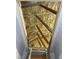 Attic access featuring spray foam insulation for energy efficiency at 3911 La Costa Ln, Largo, FL 33771