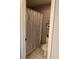 Bathroom with shower tub combo, toilet, and tiled floors at 3911 La Costa Ln, Largo, FL 33771