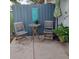 Outdoor patio with small table, seating and potted plant at 3911 La Costa Ln, Largo, FL 33771