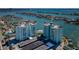 Aerial view of the condo complex, highlighting the waterfront location and surrounding community at 420 64Th Ave # 907, St Pete Beach, FL 33706