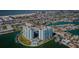 Aerial view of waterfront community with bay access and beachfront nearby at 420 64Th Ave # 907, St Pete Beach, FL 33706