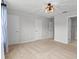 Spacious bedroom with carpet flooring, neutral paint and overhead light at 4212 Cloud Hopper Way, Lutz, FL 33559