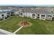 Community playground and common space offering lots of lush green grass and recreational opportunities at 4212 Cloud Hopper Way, Lutz, FL 33559