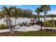 Outdoor fire pit area with seating and landscaping at 4212 Cloud Hopper Way, Lutz, FL 33559