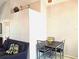 Dining space featuring a table with 4 chairs, and a loveseat to the left at 4275 Castlebridge Ln # 1325, Sarasota, FL 34238