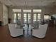The lobby provides a cozy gathering area with comfortable chairs and easy access to the outdoors at 4275 Castlebridge Ln # 1325, Sarasota, FL 34238
