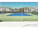 A well-maintained tennis court provides an excellent space for recreational activities and sports enthusiasts at 4275 Castlebridge Ln # 1325, Sarasota, FL 34238