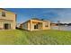 A house featuring a green lawn and views of adjacent homes at 4719 Lindever Ln, Palmetto, FL 34221