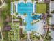 Overhead shot of a stunning community pool and slide, showcasing the luxurious recreational amenities at 4849 Isola Ct, Wesley Chapel, FL 33543