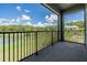 The screened balcony provides stunning lake views from this home at 4849 Isola Ct, Wesley Chapel, FL 33543