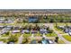 Aerial view displays proximity to pond, residential area, and local roadways at 564 Florida S Cir, Apollo Beach, FL 33572