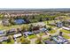 Aerial view showcasing the property's location near a pond and residential area at 564 Florida S Cir, Apollo Beach, FL 33572