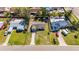 Aerial view of a home with a well-maintained lawn and mature landscaping at 564 Florida S Cir, Apollo Beach, FL 33572