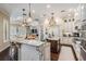 Bright, spacious kitchen with granite countertops, double islands, and stainless steel appliances at 5914 Fitzgerald Rd, Odessa, FL 33556