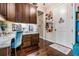 Inviting office space features hardwood floors, built-in cabinets, and desk area at 5914 Fitzgerald Rd, Odessa, FL 33556