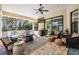 Spacious covered outdoor patio with comfortable seating and outdoor entertainment area at 5914 Fitzgerald Rd, Odessa, FL 33556