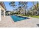 Beautiful pool area with ample patio space, perfect for enjoying outdoor living and entertaining at 5914 Fitzgerald Rd, Odessa, FL 33556