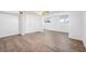 Spacious bedroom features hardwood flooring and double windows for natural light at 9017 Petal Ct, Hudson, FL 34667