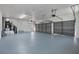 This spacious garage offers ample parking, pedestrian door, and a utility area at 902 Marco Ne Dr, St Petersburg, FL 33702