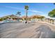 Attractive exterior of the community clubhouse, showcasing palm trees and inviting architecture at 9425 Blind Pass Rd # 1003, St Pete Beach, FL 33706