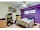 Bedroom featuring a ceiling fan, window, and plenty of space for customization at 9433 Harbor Greens Way # 405, Seminole, FL 33776