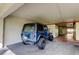 Garage with blue Jeep for parking at 9433 Harbor Greens Way # 405, Seminole, FL 33776