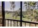 Screened lanai showcasing views of the outdoors at 9433 Harbor Greens Way # 405, Seminole, FL 33776
