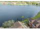 Aerial view of the townhome near a beautiful lake at 9730 Lake Chase Island Way # 9730, Tampa, FL 33626