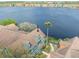 Townhome aerial view showcasing lakefront living at 9730 Lake Chase Island Way # 9730, Tampa, FL 33626