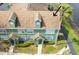Aerial view of townhome featuring a new roof at 9730 Lake Chase Island Way # 9730, Tampa, FL 33626