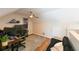 Carpeted upstairs bonus room with ceiling fan and cozy seating area at 9730 Lake Chase Island Way # 9730, Tampa, FL 33626
