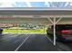Assigned carport parking with reserved space for residents at 9730 Lake Chase Island Way # 9730, Tampa, FL 33626