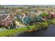 Beautifully maintained two-story condo in a well-manicured community, with mature trees and a lake view at 9730 Lake Chase Island Way # 9730, Tampa, FL 33626
