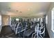 Well-equipped gym featuring treadmills, exercise bikes, and weight machines at 9730 Lake Chase Island Way # 9730, Tampa, FL 33626