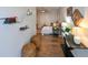 Living room featuring hardwood floors, neutral walls, shelves and decorative lamps at 9730 Lake Chase Island Way # 9730, Tampa, FL 33626