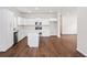 Bright and open kitchen featuring an island, stainless steel appliances, and white cabinetry at 1001 Newton S Ave, St Petersburg, FL 33705