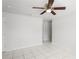 Spacious living room featuring neutral paint, tile floors, and a ceiling fan at 1225 Harvest Home Ct, Ruskin, FL 33570