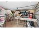 Spacious garage with ample storage, featuring a workspace and room for various projects at 13206 Lewis Raulerson Road, Dover, FL 33527